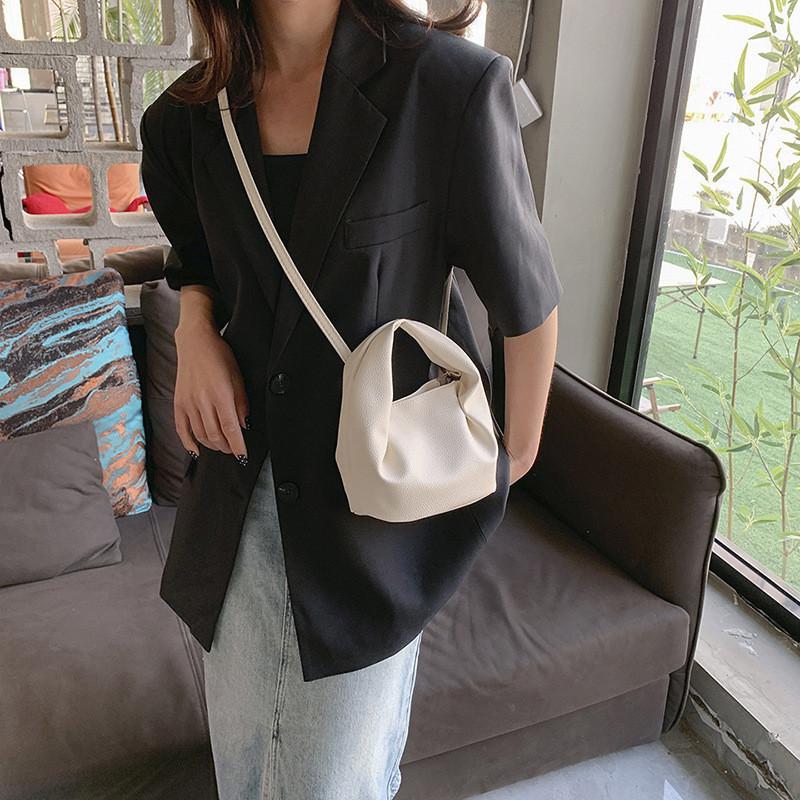 Sac à main chic pour femme style décontracté en matériau PU Sac bandoulière pour l'été 2023
