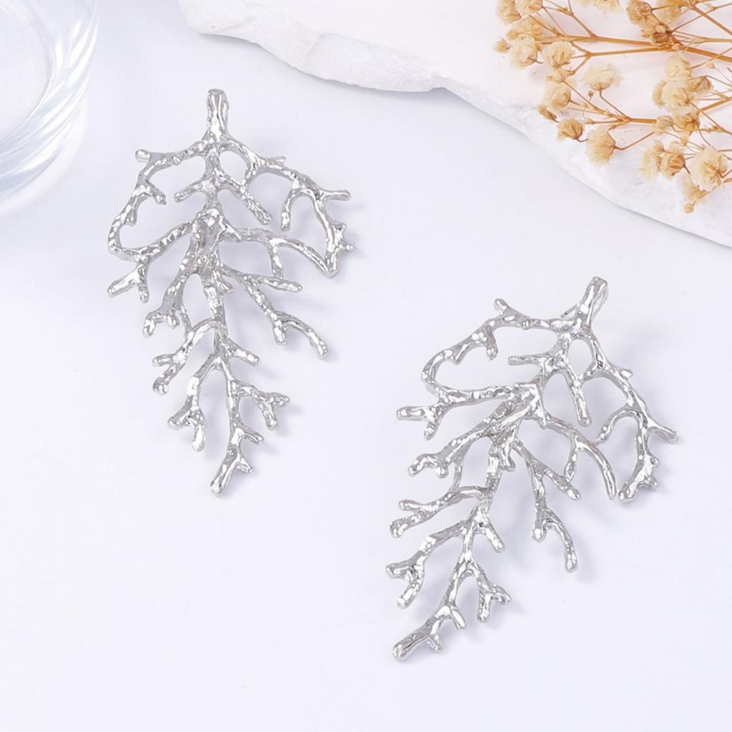 Personality trend cold wind temperament texture alloy coral stud earrings light luxury beach vacation wind women's earrings