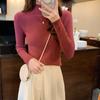 Nuevo invierno ajustado tejido de punto Color sólido cuello redondo señoras moda camisa por el trasero suéter mujer ropa