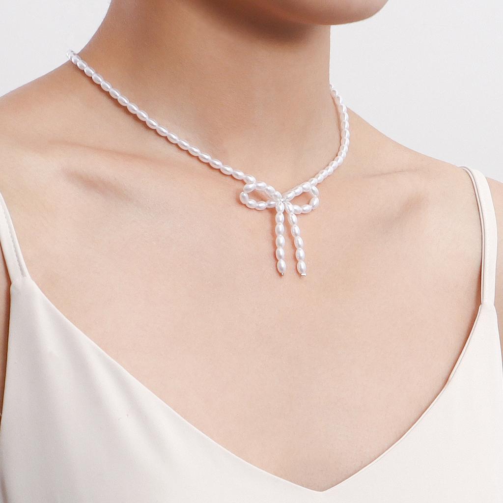 Jewelry choker bow imitation pearl necklace women's niche design sense light luxury beaded necklace