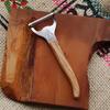 The NERON Peeler Features a Comfortable Wooden Handle and Laguiole Olive Made In This Peeler Combines the Elegant Design and Artisanal Sharpness of a