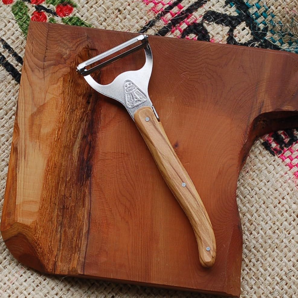 The NERON Peeler Features a Comfortable Wooden Handle and Laguiole Olive Made In This Peeler Combines the Elegant Design and Artisanal Sharpness of a