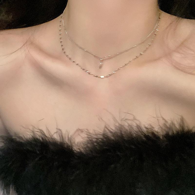 High-End Kreuz Feine Halskette Damen Herbst und Winter Schlichte Doppellagige Stacking-Accessoires Leichter Luxus Nischendesign Schlüsselbeinkette Tide
