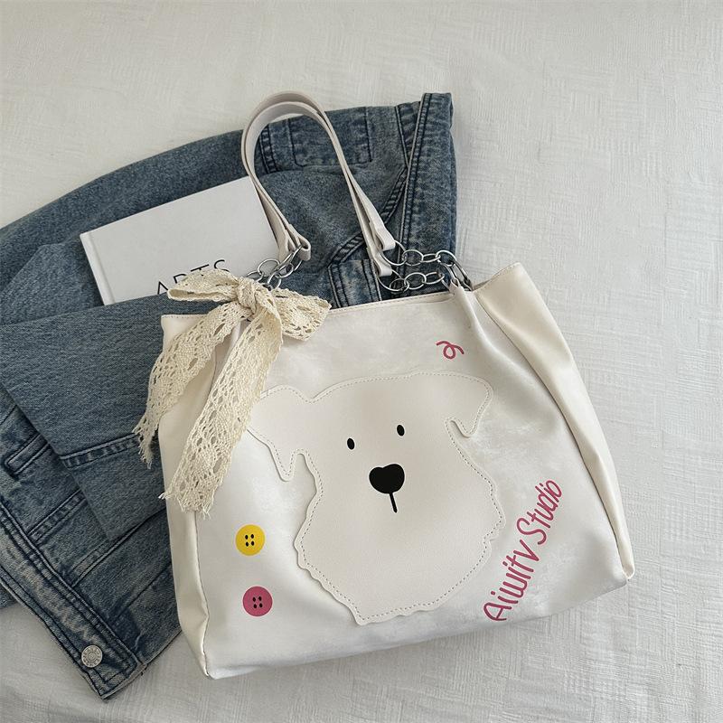 

Women s bag 2025 summer new popular commuter fashion cute dog pattern design shoulder crossbody bucket bag