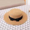 Korean Straw Hat for Women: Retro Flat Top Fedora, Sunshade & Sunscreen, Ideal for Outdoor Summer Beach Travel.