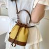 Stylish and simple contrasting color bucket bag women's 2025 new shoulder messenger bag high value casual strap handbag