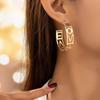 Trendy LOVE Hollow Letter C-Shaped Stud Earrings - Elegant and Perfect for Parties or Daily Wear.