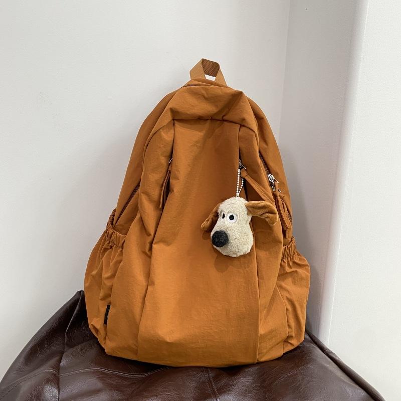Travel lightweight advanced sense niche backpack college student commuter junior high school girls schoolbag Japanese and Korean simple backpack