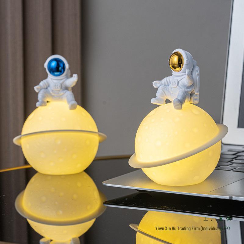Astronaut Night Light Planet Lamp: Luminous Moon Ornament for Bedroom Decor, Gift, or Souvenir with Silk Flower.