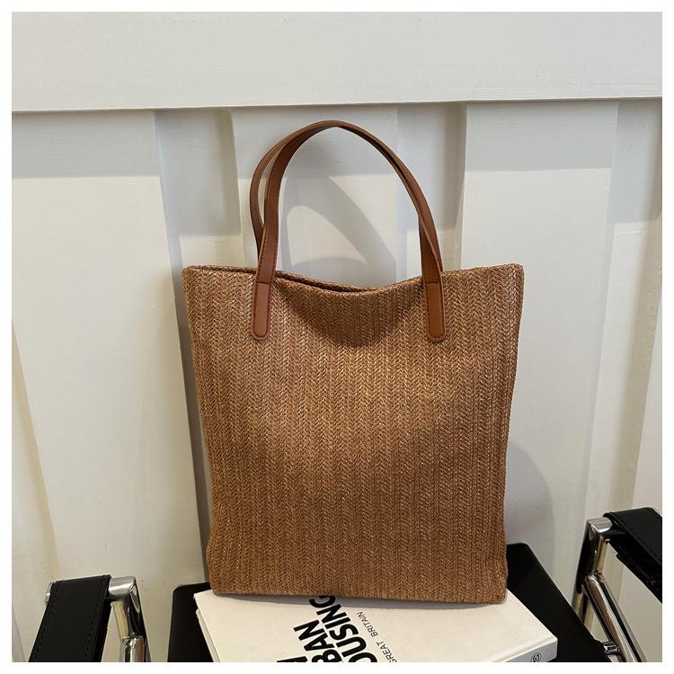 

Модная дорожная большая вместимость солома 2025 зарубежный стиль новая летняя популярная личность одно плечо тоут отпуск большая сумка женщина коричневый