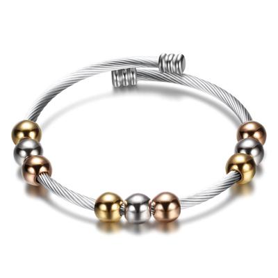 Bracciale regolabile in acciaio al titanio con catena intrecciata a molla, perline tricolore, bracciale personalizzato alla moda in acciaio oro rosa