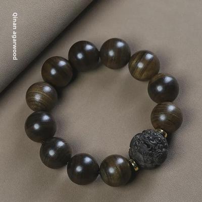 Bracciale Etnico Tigrato in Legno di Agarwood con Bodhisattva da Uomo e Donna - Collezione di Gioielli con Perline Buddiste