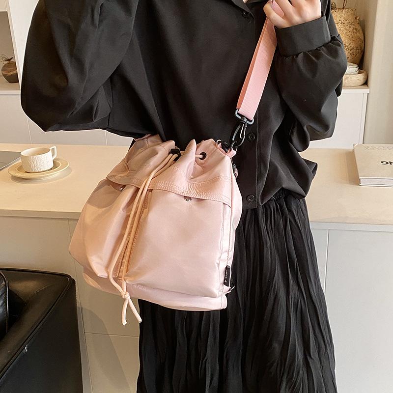 Popular small backpack women 2025 new fashion versatile large capacity nylon shoulder bucket bag girl messenger bag
