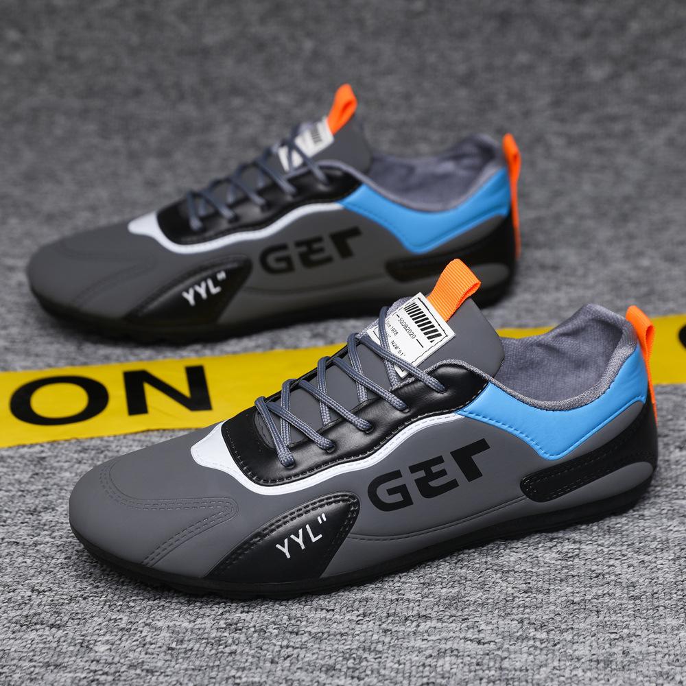 

Spring new men s shoes leather waterproof trend student shoes sports and leisure shoes versatile Korean version of Doudou shoes 44 сірий колір