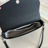 26 New leather women's bags, first layer cowhide lychee pattern envelope, mini small bag chain, single shoulder oblique span bag cross-border.