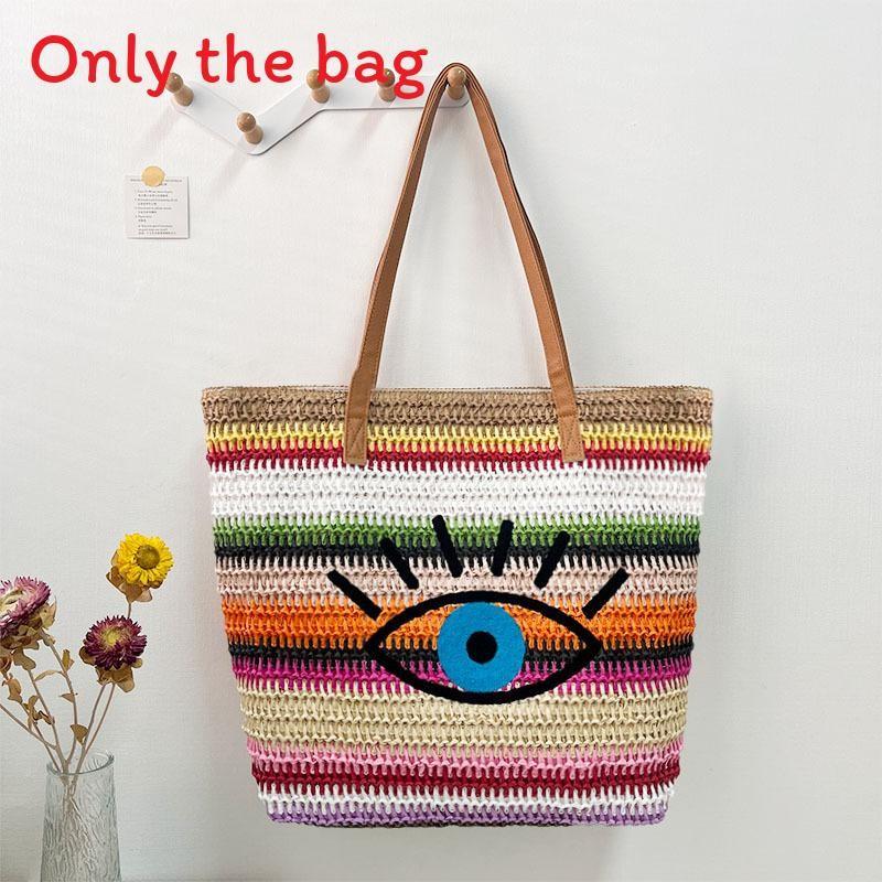 Große geflochtene Raffia-Strandtasche mit Augen-Print-Design und zwei Schultergurten für den Urlaub