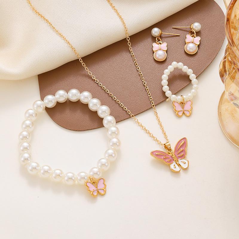 Charming Pearl Butterfly Jewelry Set: Necklace, Earrings, Ring & Bracelet