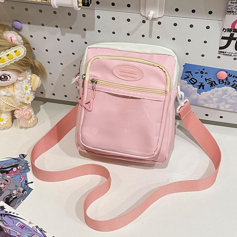 

2025 сумка-мессенджер для девочки маленькая сумка-портфель прилив студенческий рюкзак комикс-шоу персонализированная сумка для мобильного телефона With medal розовый