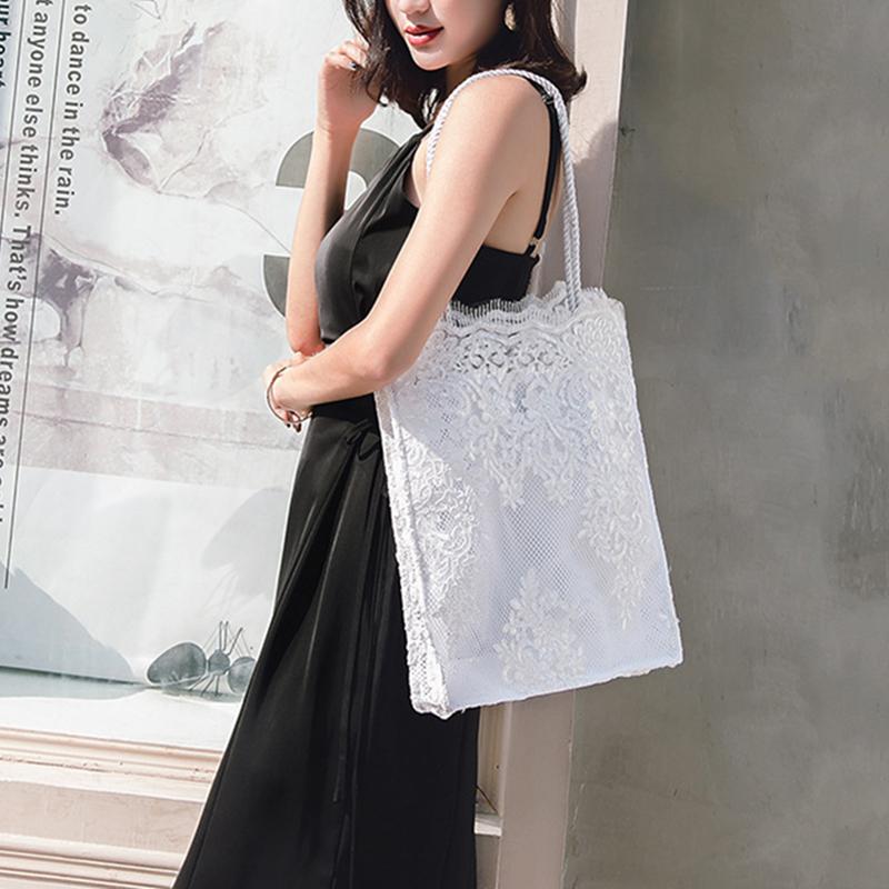 

Модна мереживна сумка через плече. Жіноча повсякденна вишита порожниста сумка. Вінтажна квіткова сумка для покупок білий