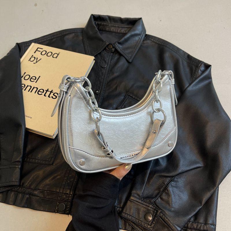 

Niche hand-held underarm bag women s summer 2025 new high-end silver bag fashion chain shoulder messenger bag срібний
