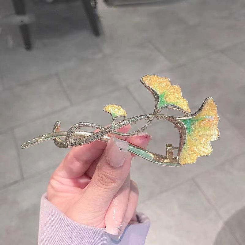 Factory direct fashion flower pearl twist clip elegant hairpin Internet celebrity head spring clip