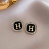Elegant Gold-Plated Black Zircon Stud Earrings - Niche Design for a Luxurious Fashion Statement