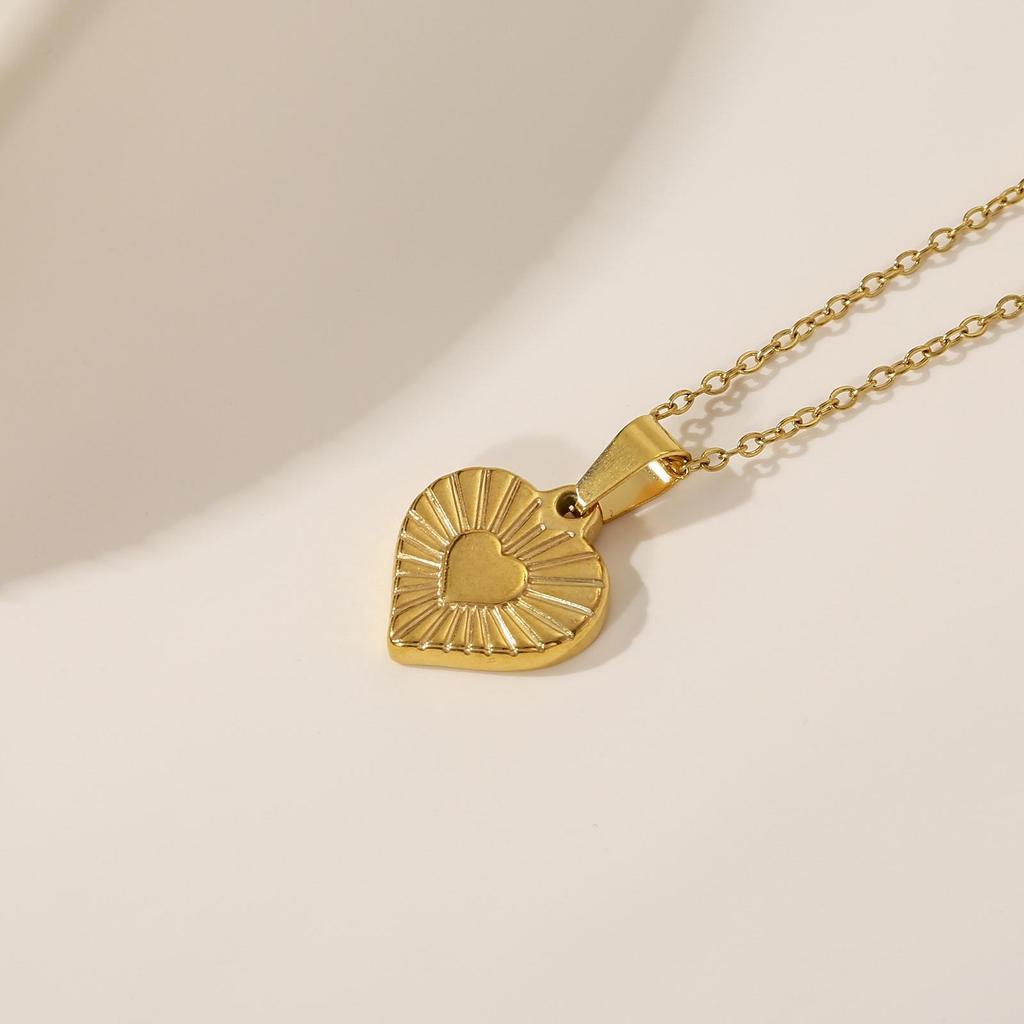 Golden Heart Clavicle Necklace with Radial Pattern In Stainless Steel