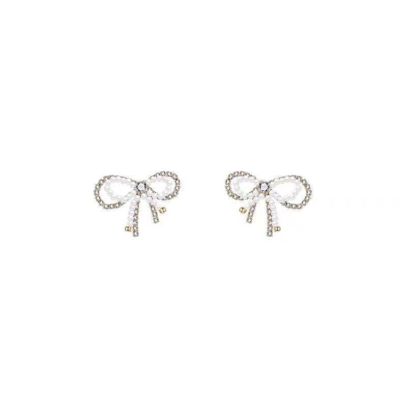 Elegant Pearl Bow Earrings: Chic, Trendy, and Exquisite Design for a High-End, Sophisticated Look.