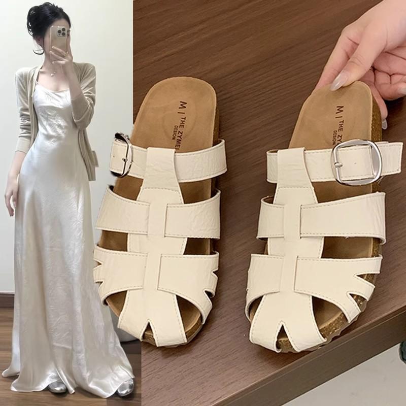 Leather baotou women's new summer hollowed-out woven one-pedal outer wear half-drag casual cool slippers