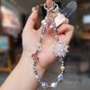 Niche high-end crystal mobile phone chain female rose snow lotus wrist pendant beaded pendant bracelet short