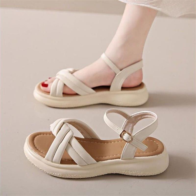 

One-word buckle flat-soled soft-soled beach shoes 2025 summer new cross-strap Internet celebrity student sandals women s Roman shoes 40