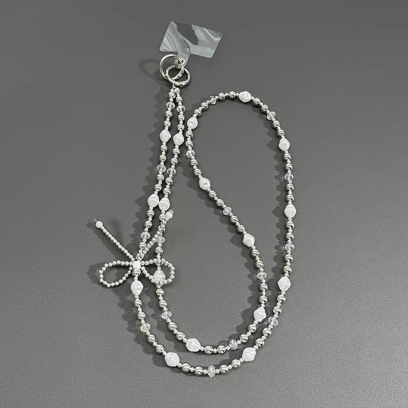 Creative new mobile phone lanyard, pearl bow, bead string, crossbody luggage accessories, phone case, chain pendant