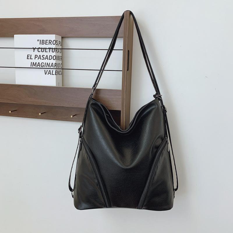 

Женская сумка из мягкой кожи 2025 новый рюкзак большой вместимости модная сумка-мессенджер простая повседневная трендовая сумка-тоут чёрный