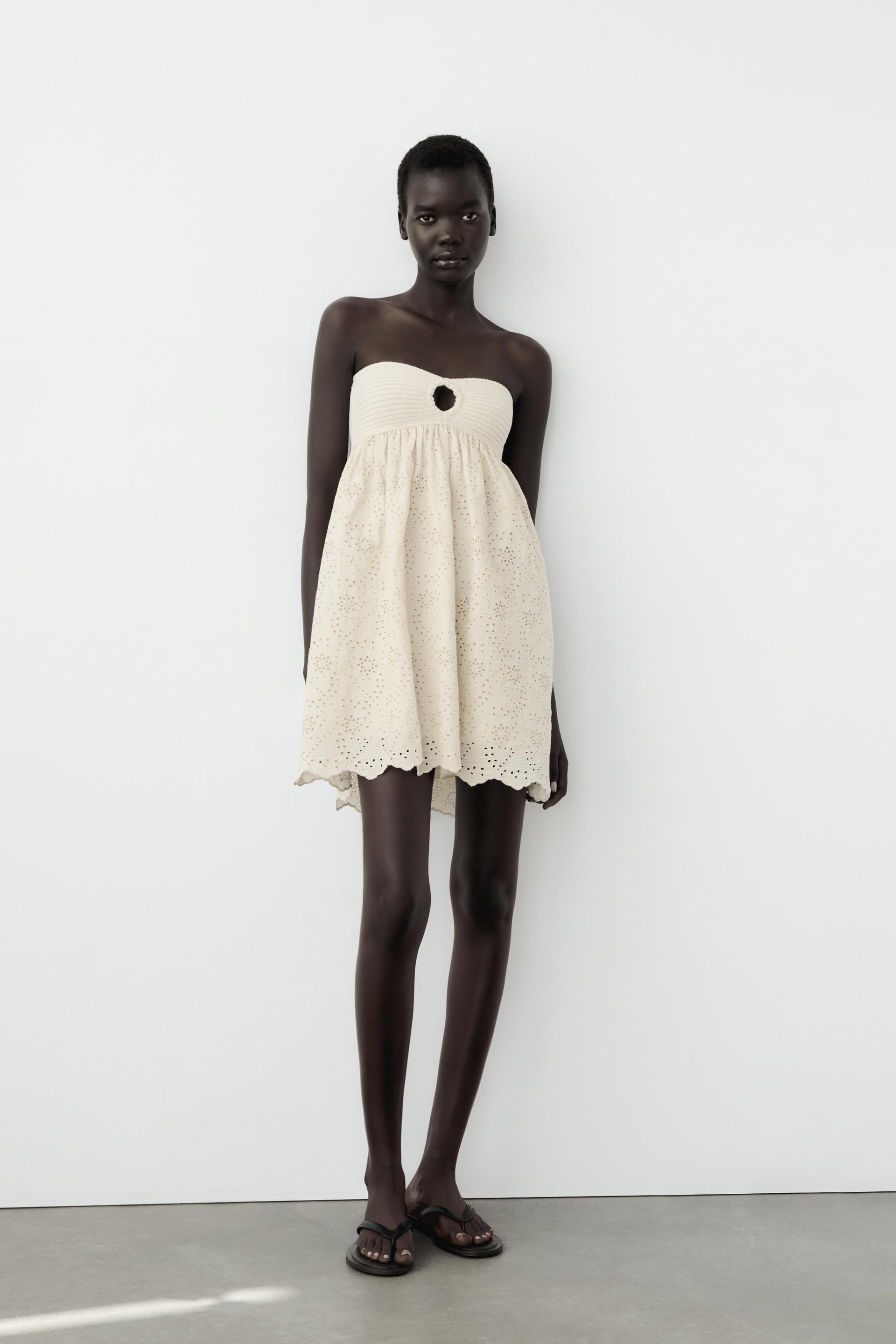 

ТРИКОТАЖНОЕ ПЛАТЬЕ С КОМБИНИРОВАННОЙ ВЫШИВКОЙ