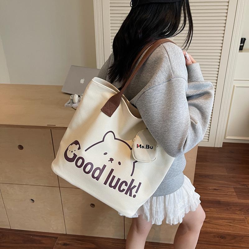 Japanese canvas bag women's shoulder bag 2025 summer new literary style large-capacity simple portable printed canvas bag