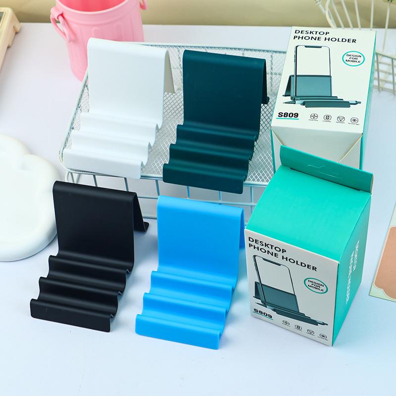 Universal Creative Phone and Tablet Stand for Desktop