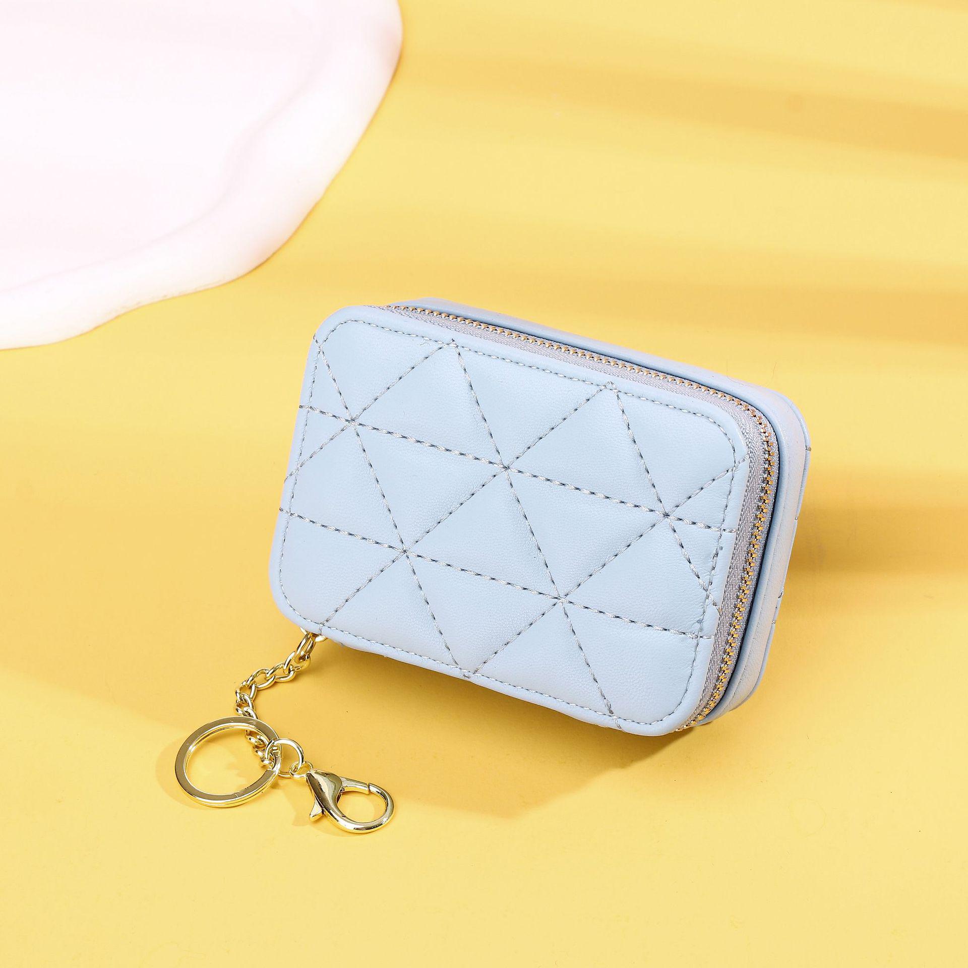 

«Мини-сумочка для помады с вышивкой ромбами и зеркальным брелоком» 11x4x7.5 светло-синий