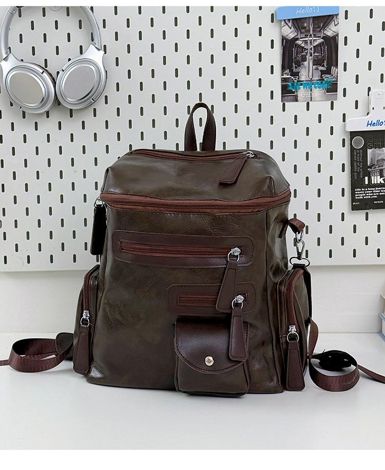 Schoolbag European and American retro silver nail-trimmed backpack couple high street locomotive wind light and versatile class storage backpack