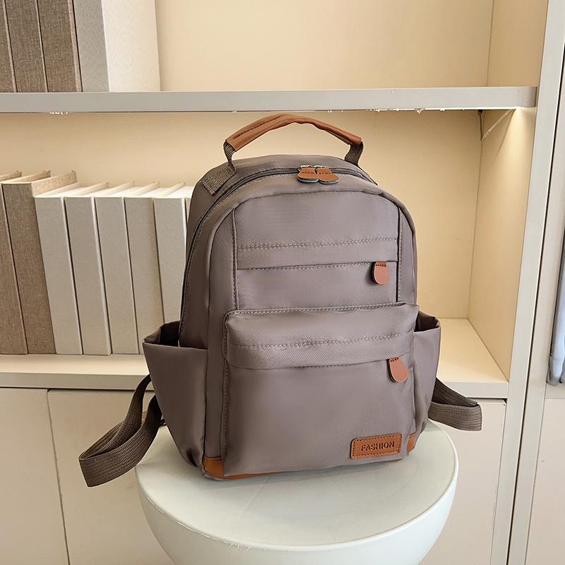 2025 new high-value ins style simple leisure travel lightweight backpack women's small schoolbag college student backpack