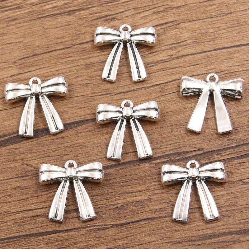 

10 шт. DIY Сплав Ювелирные изделия Маленькие Аксессуары Полый Милый Кулон-бантик 21*21mm