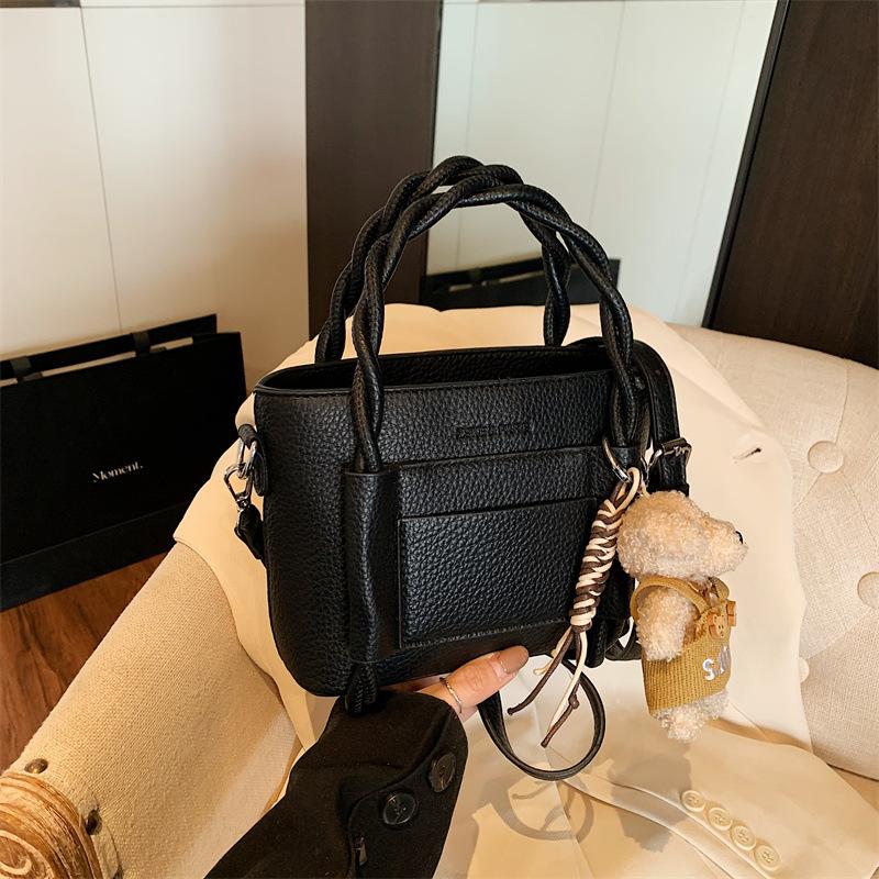 Stylish and simple interwoven rope hand withdrawal bucket bag simple casual texture bag daily versatile shoulder messenger bag