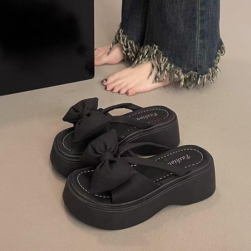 

Bow thick bottom heightening 7CM slippers women s summer wear fashion fairy style 2025 new one-word sandals 35