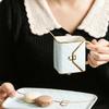 Quilted luxury bag, ceramic mug, plate, and spoon set for one person