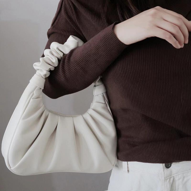 Niche design cloud bag  armpit bag  pleated handbag  fashionable and trendy hand-held cow horn high-end bag