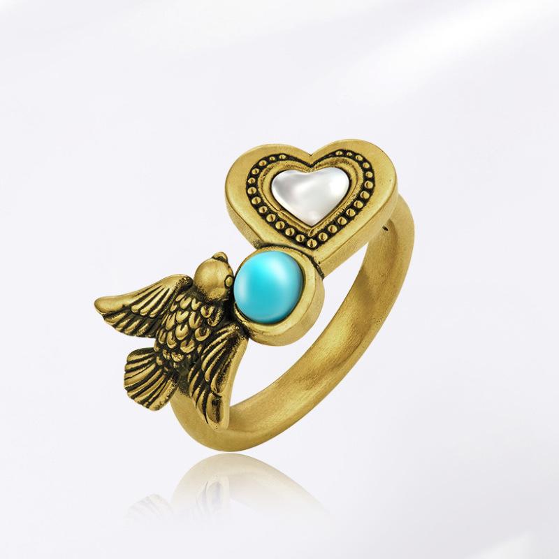 

Black Contemporary Adjustable Gold Heart Bird Ring For Chic Womens Style Jewelry