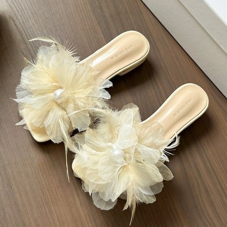 Fashion going out flat-bottomed fairy thick-heeled cool slippers 2025 super fairy niche design feeling flower word cool slippers woman