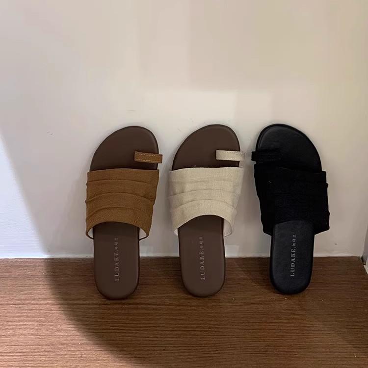 Fashion flat-bottomed pinch Roman slippers women's shoes wear summer cotton and linen sandals sandals design sense one-word slippers women