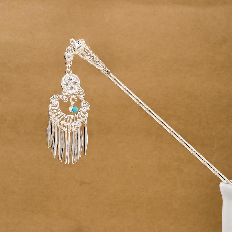 

Ethnic style imitation Miao silver colored long feather fringed earrings, hot selling in attractions, antique hairpin jewelry for women