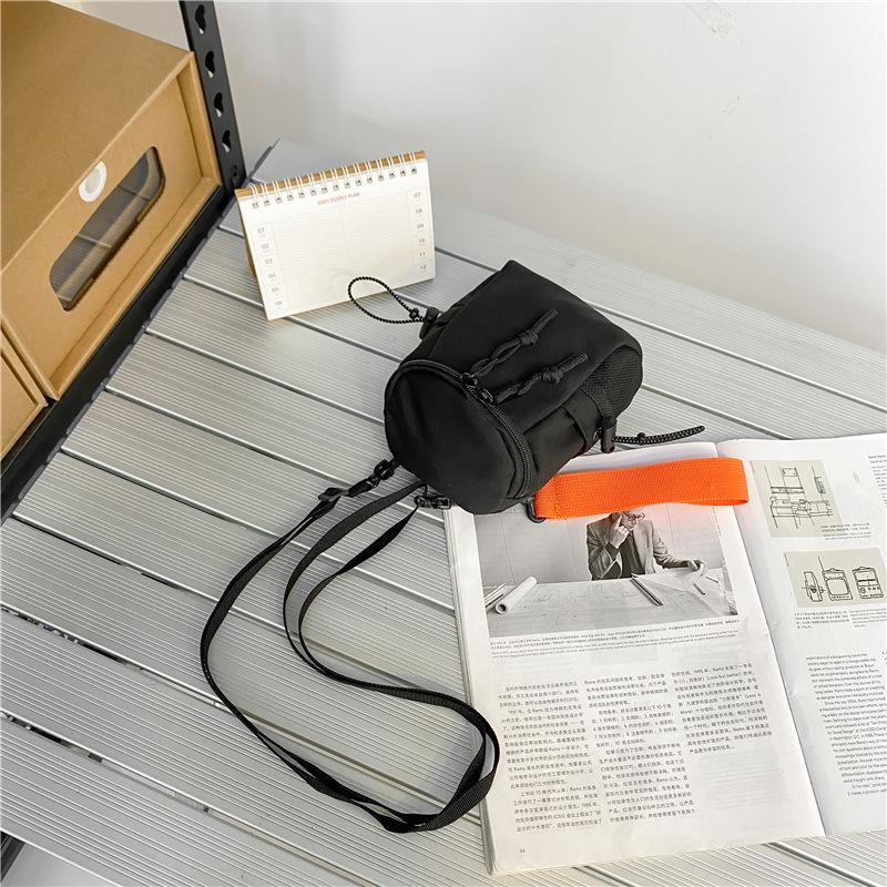 

Change bag, hanging bag, mini shoulder bag, small backpack, earphone bag, mobile phone bag, women s and boys small satchel, men s messenger bag. чорний