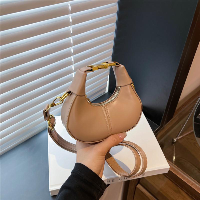 

Нишевый дизайн мини-сумка-пельмень женская 2025 весна новая модная и универсальная высококлассная на плечо/кроссбоди хаки